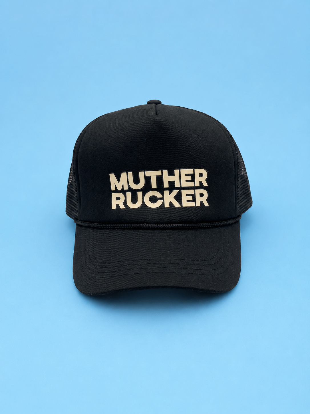 Black Muther Rucker trucker hat with bone lettering